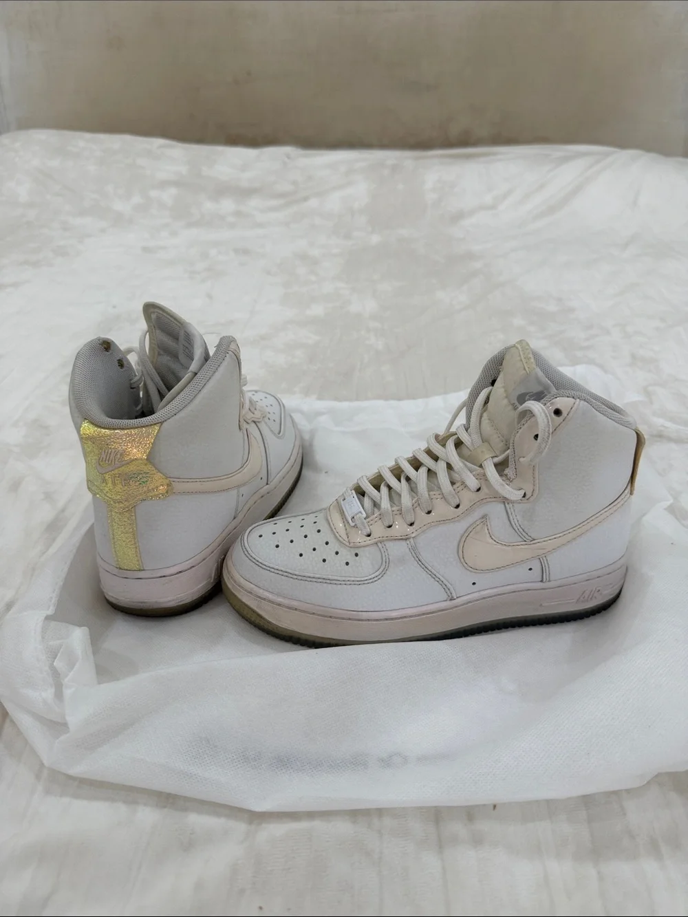 Nike Women’s High-Top Sneakers in White with Gold Heel Accent